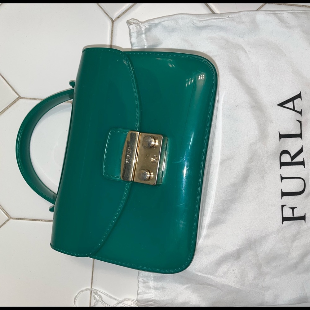 The Furla green Mini Candy Bag is perfect for summer and goes with any outfit.